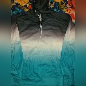 Long sleeve top hoodie style. Runs true to size